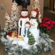 Snowmen family Christmas scene by Interior Tropical Gardens